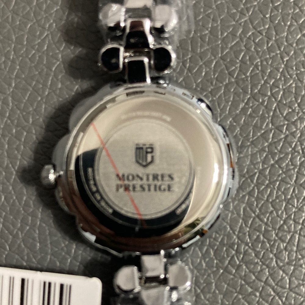 Montres Prestige X Invicta
Women's Watch, model number MPW-0236. 28MM Steel - Picture 6 of 7